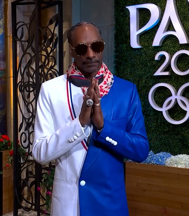 Rapper Snoop Dogg, who hosts the Olympics for US broadcaster NBC, also features in the star-studded video