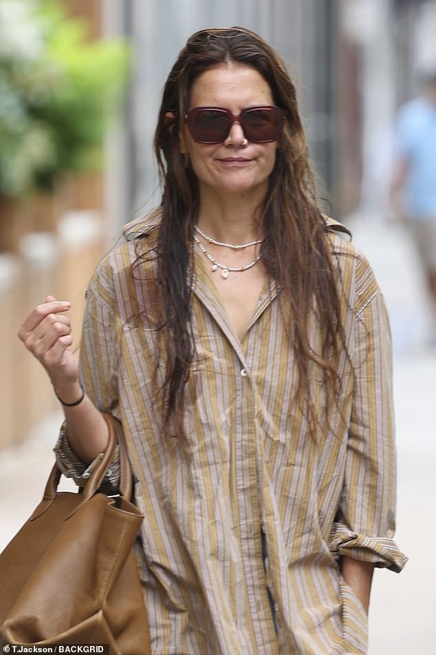 The 45-year-old Dawson's Creek star looked stunning in a tan and white striped shirt and light-colored jeans