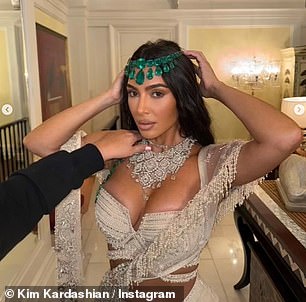 In one fell swoop, Kim added an extra touch to her luxurious look with a statement necklace that featured 170 carats of diamonds, according to Page Six