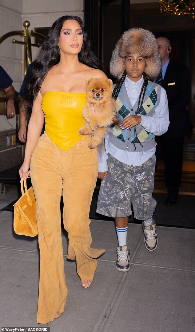 Kim Kardashian's daughter North West took a style cue from stepmom Bianca Censori when she stepped out in New York City on Wednesday, August 14.