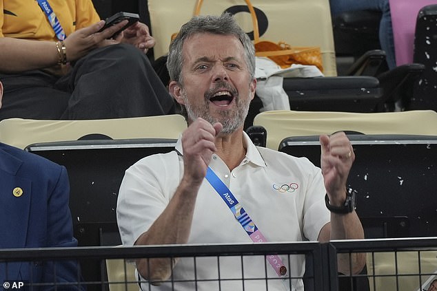 King Frederik X puts on a lively show during the men's doubles badminton semi-final on Friday