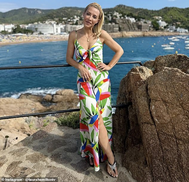 Earlier this week, Laura shared a photo of herself on Instagram wearing a botanical print dress, which she accessorized with sparkly black sandals