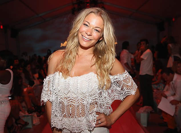 LeAnn Rimes (pictured) has shared how she struggled with the pressure of public expectations while growing up in the spotlight