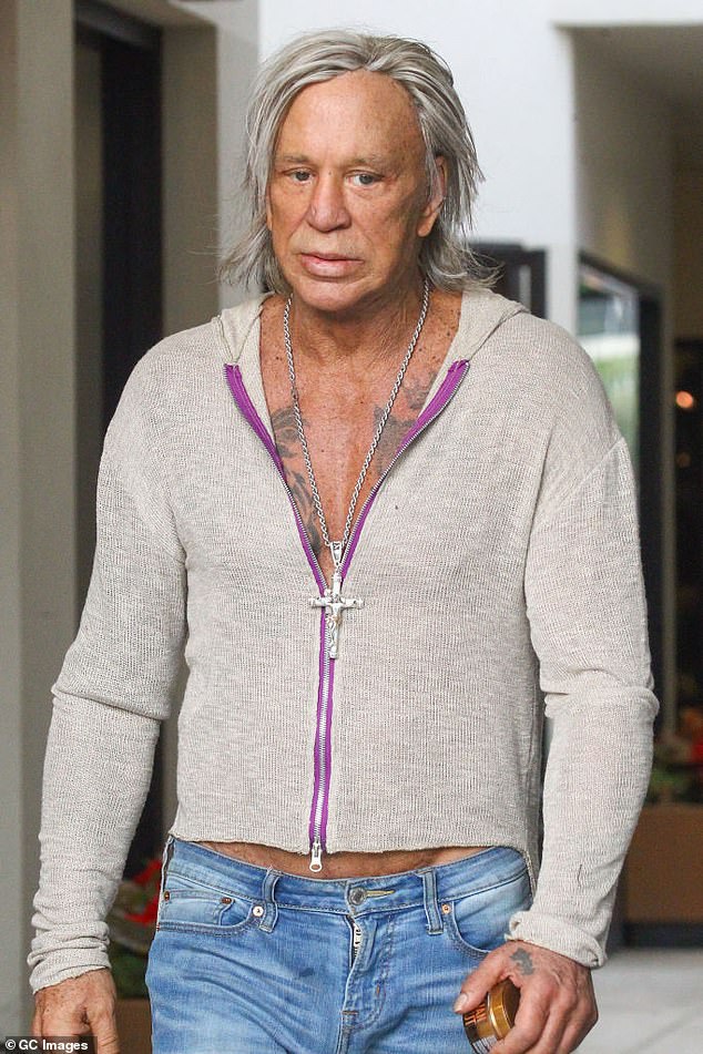 Lizzie also talks about the time she was pulled over by the police, but she secretly hid The Wrestler star Mickey Rourke (pictured) in the trunk of her car