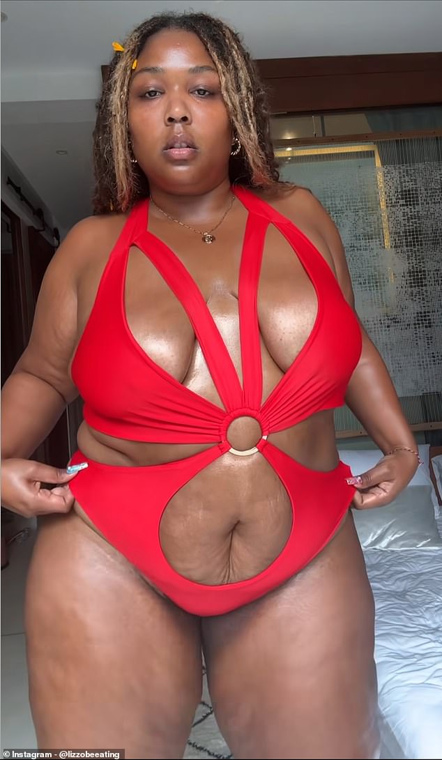 Lizzo wore a daring red swimsuit with cutouts on Instagram on Tuesday during her 'gap year' in Bali, after showing off her dramatic weight loss