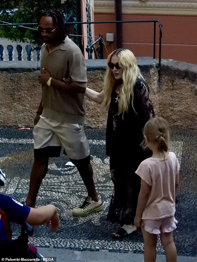 Madonna was spotted walking hand in hand with her new boyfriend Akeem Morris, who is 37 years her junior.