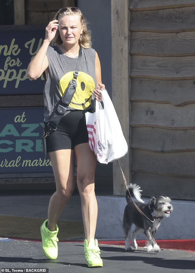 Malin Akerman was spotted leaving Lazy Acres Natural Market on Tuesday. The Rampage star, 46, showed off her unique style as she walked her terrier mix dog on her day off in the posh Los Angeles neighborhood of Los Felix