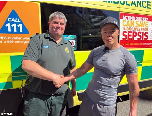 Darren Harris pictured with paramedic Gary Williams who responded to the 999 call