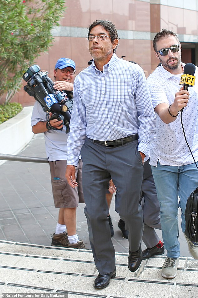 Dr. Mark Chavez ignored a crowd of press demanding answers about the Friend star's death and addiction