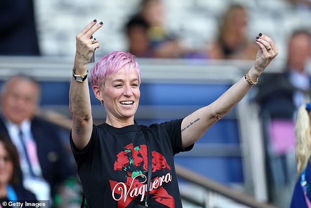 Megan Rapinoe sits in the stands for Team USA's Olympic gold medal final against Brazil