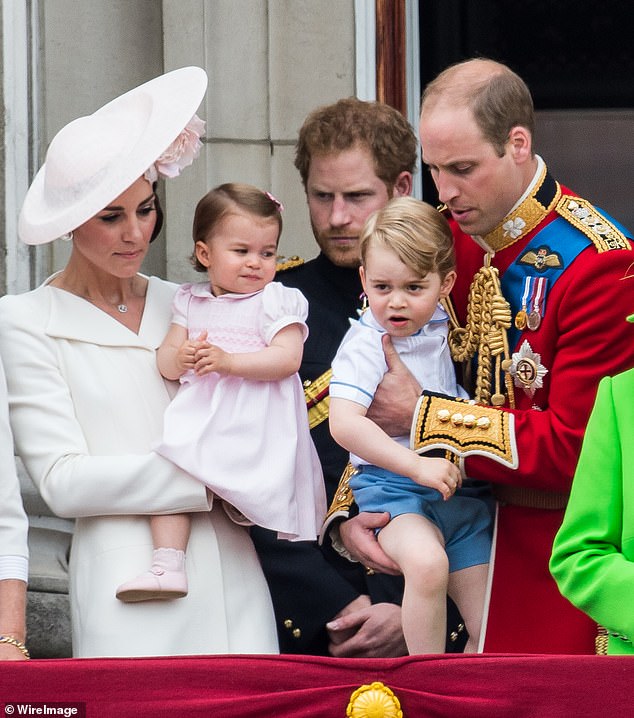 Kate (far left), Princess Charlotte (left), Prince George (right), Prince Harry (centre), Prince William (far right) stand on the balcony during Trooping the Colour in 2016.