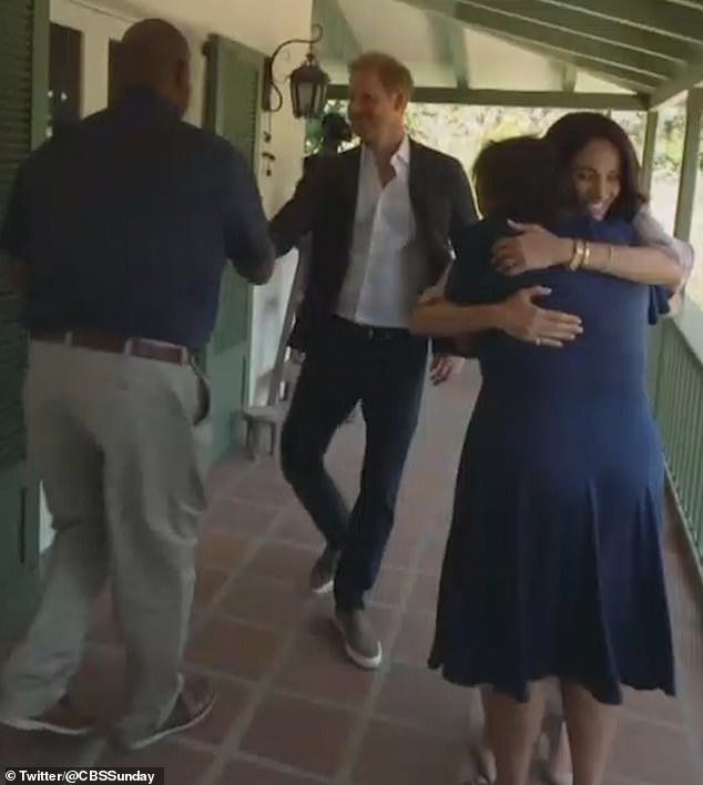 Harry and Meghan were shown embracing their parents from The Parents' Network as they met in person for the launch