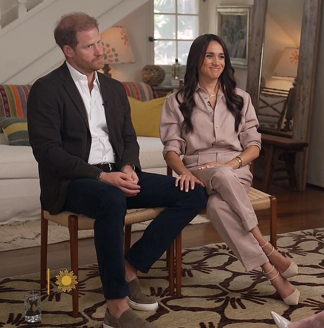 Meghan placed her hand on Harry's leg as Jane Pauley asked her about her experiences with suicidal thoughts