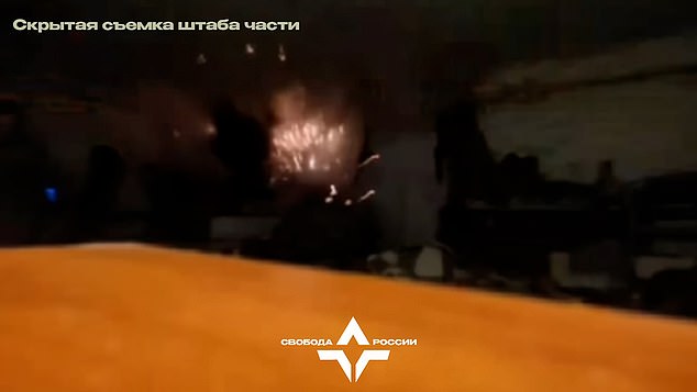 A snapshot of the moment a Russian soldier blew up his own camp before defecting to the Ukrainian front line