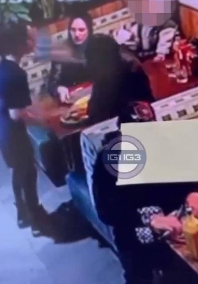 A shocking video has emerged showing a waitress at Nando's being hit in the face with a plate by a disgruntled customer