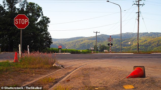 A 37-year-old woman has been found dead on a road in north Queensland in what is believed to be a hit-and-run collision (pictured is the Captain Cook Highway near Mossman)