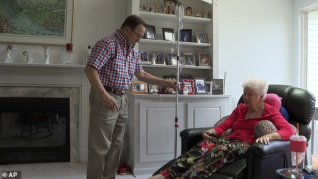 Sue Fleming pictured at home with her husband Patrick after the injury