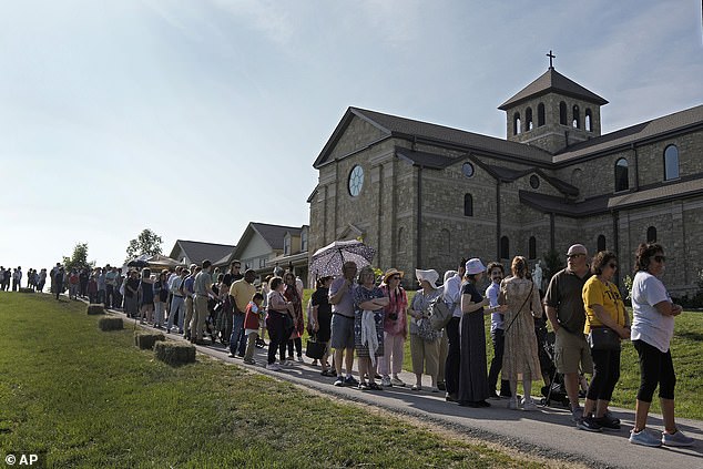 People wait on Sunday to view the body of Sister Wilhelmina Lancaster at the Benedictine Abbey of Mary, Queen of the Apostles