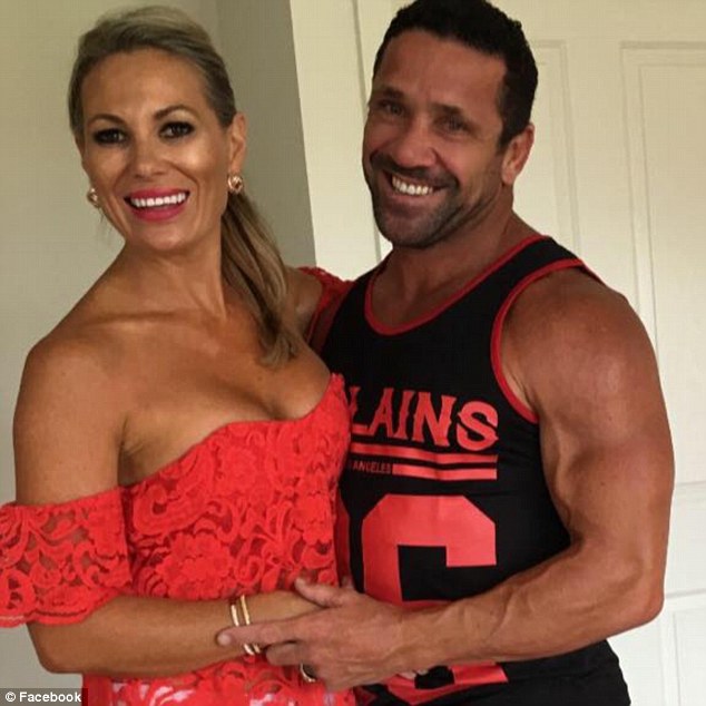 Robbie O'Davis and his former cheerleader wife Louise have split after his progressive brain disease caused irreconcilable problems in their troubled marriage