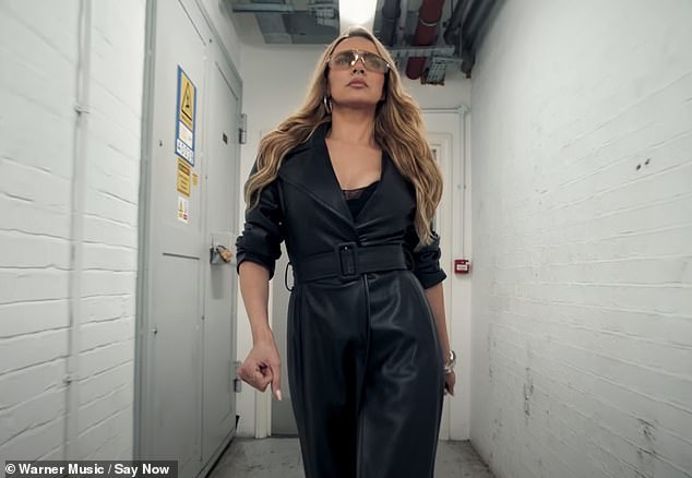 Nadine Coyle looked absolutely sensational as she made a guest appearance in girl group Say Now's new music video for their song Trouble