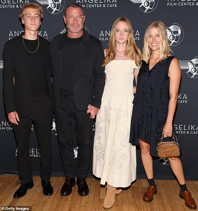 Liev Schreiber, 56, proudly posed alongside his wife Taylor Neisen (right), 32, and his children Sasha (left), 17, and Kai (second from right), 15, at the New York premiere of his new film