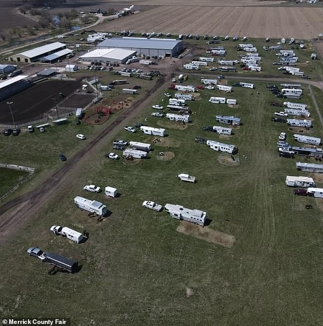 Police said she left the baby in a car at the Merrick County Fairgrounds (pictured) and was riding a horse when they arrested her.