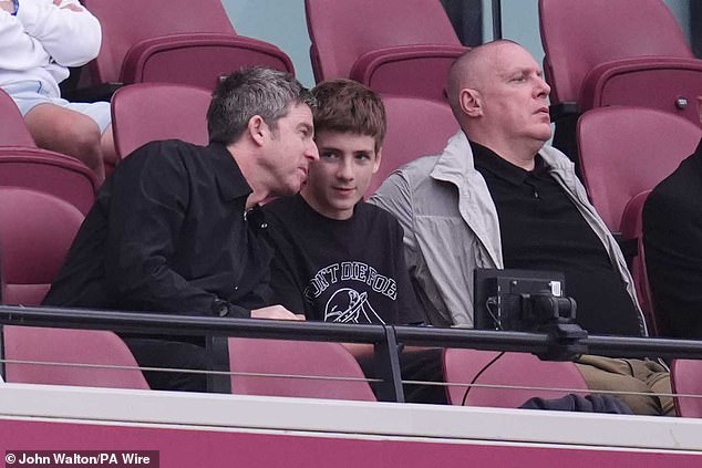 Noel Gallagher spent some quality time with his son Donovan on Saturday to cheer on Manchester City, while Oasis fans queued for tickets to the band's reunion tour