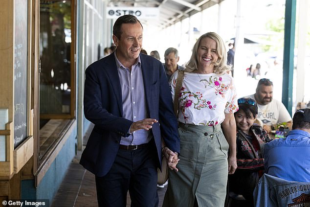 Mark McGowan (pictured with his wife Sarah) has had five jobs since leaving politics due to exhaustion