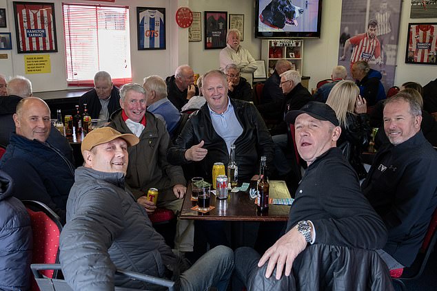 Hurlford United supporters enjoy a refreshment during half time at Maggie's bar