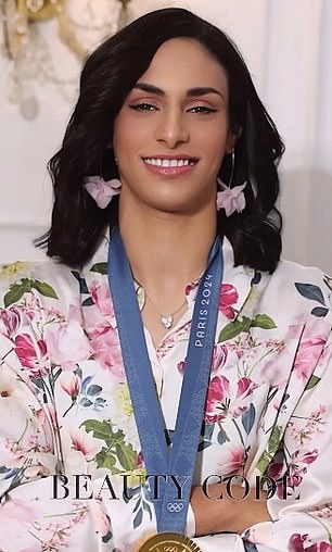 Imane Khelif poses for the cameras and shows off her gold medal from the Paris Olympics