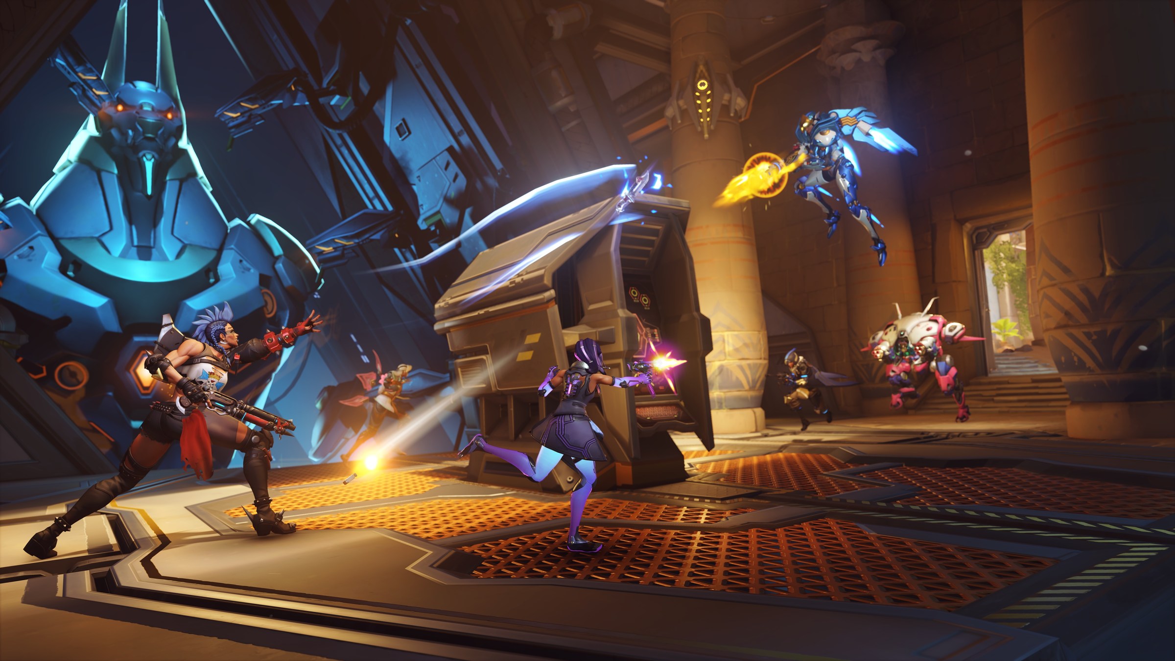 Junker Queen, Ana, Lifeweaver, D.Va, Sombra, and Pharah fight over a computer terminal on the Throne of Anubis map in an Overwatch 2 screenshot