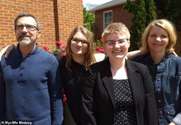 Virginia Christine Vinton, 57, mother of two from North Carolina, with her husband Jim, 59, and daughters Abby and Emily