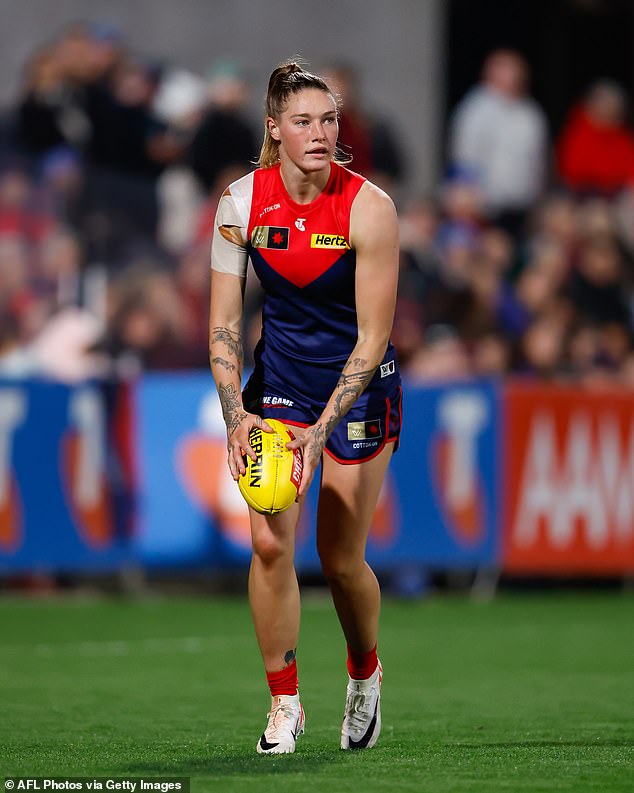 Some have questioned whether Harris (pictured) should have gone to Paris at all, given that the AFL Women's season starts in three weeks and she is struggling to recover from a shoulder injury.