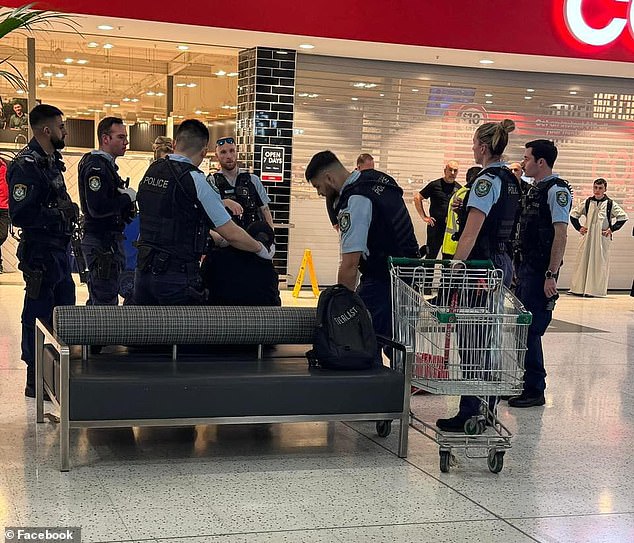 Shocked bystanders reportedly witnessed a man stabbing himself with a knife in a busy shopping centre in Sydney's west