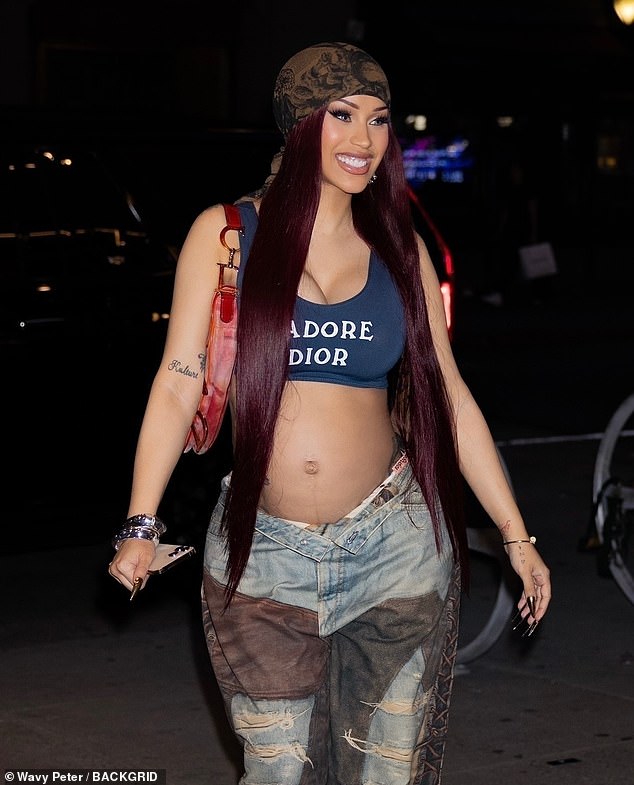 Pregnant Cardi B put on a brave face as she stepped out amid her ongoing divorce from Offset