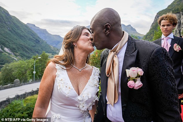 Princess Martha Louise of Norway and her American groom Shaman Durek entertained the crowds lining the streets by sharing a kiss to mark the wedding after three days of festivities