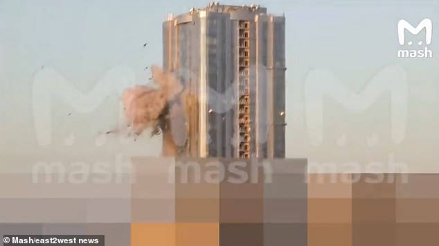 Video identified by Russian Telegram channels SHOT and Mash as a high-rise residential building in the city, with a damaged side and multiple blown-out windows on three floors