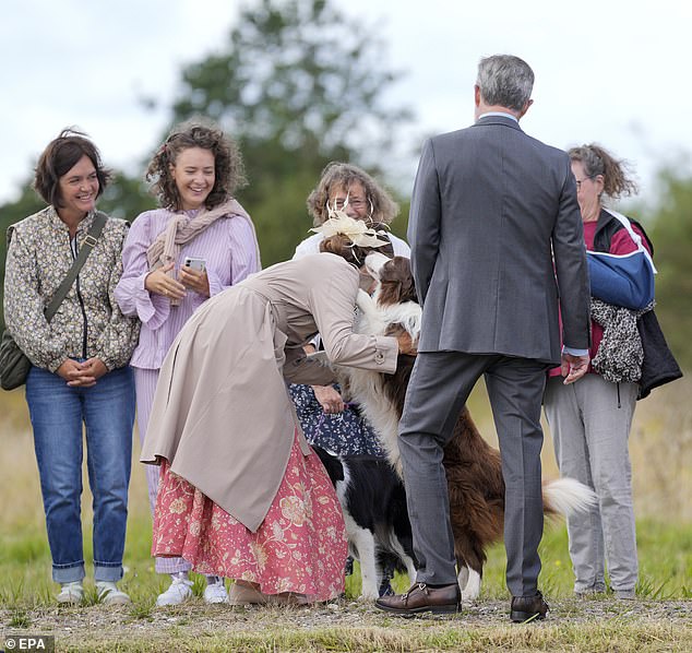 Queen Mary was given a tour of the city, greeted fans and helped some children plant a tree before turning her attention to two wagging Collies