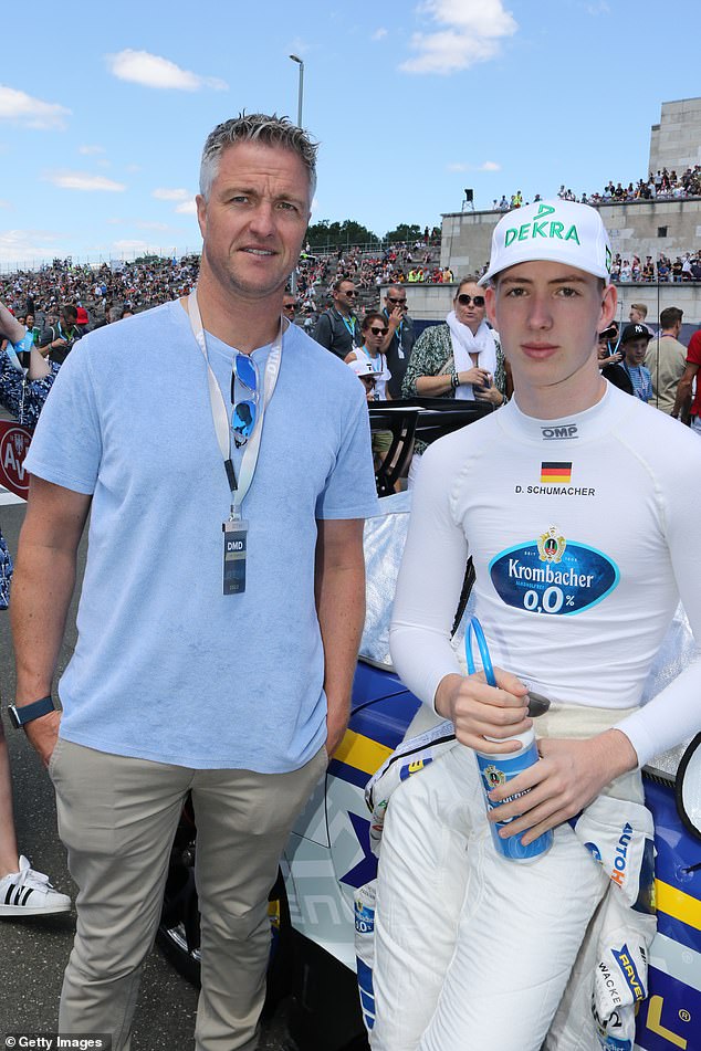 Their son David Schumacher, right, also a racing driver, spoke out in support of his father when he came out as gay