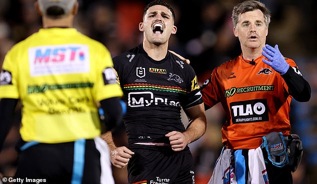 Nathan Cleary reacts after taking a knock to the shoulder in Penrith's defeat to Melbourne