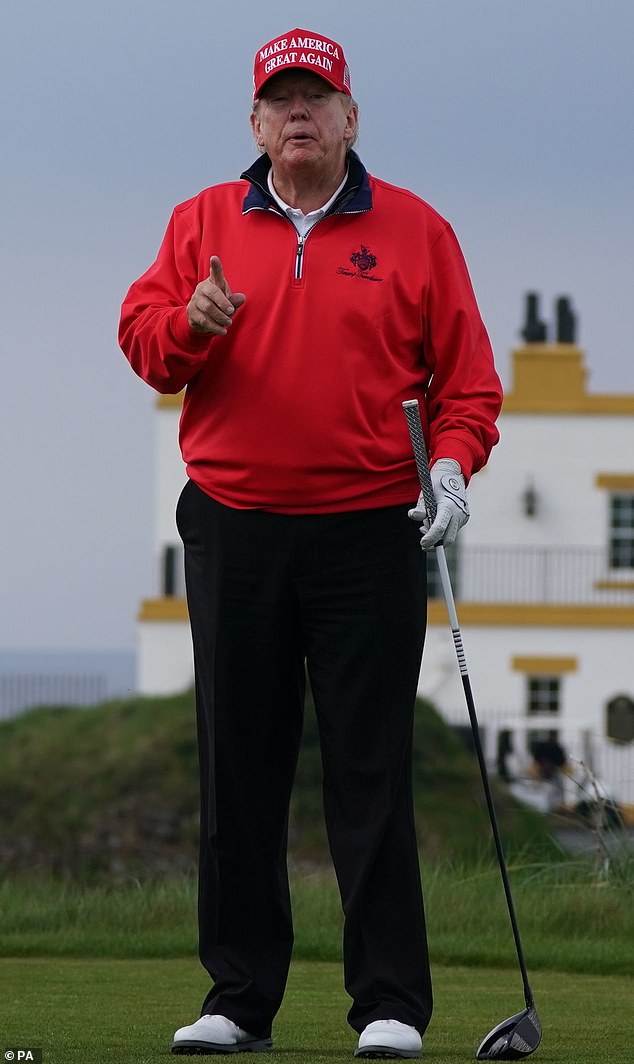 Former US President Donald Trump plays golf at his Trump Turnberry course in South Ayrshire during his visit to the UK