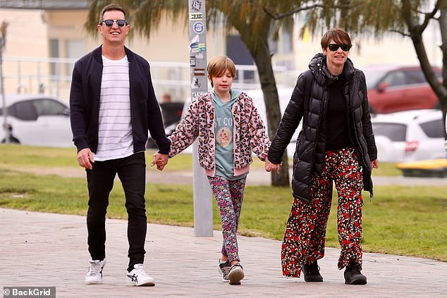 Rove McManus and his wife Tasma Walton were spotted taking a stroll on Sydney's famous Bondi Beach with their 10-year-old daughter Ruby on Monday. All in the picture