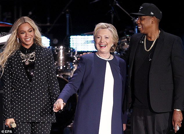 Beyoncé (left) during her only campaign appearance in 2016 in support of Democratic candidate Hillary Clinton. She and her husband Jay Z (right) held a concert in support of Clinton in Cleveland, days before the election