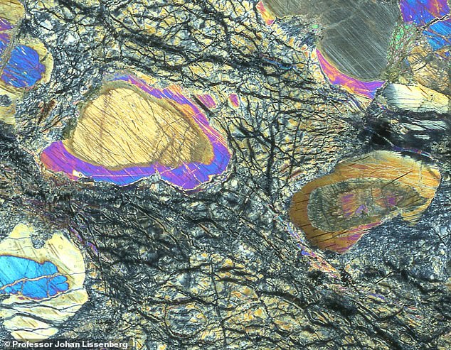 Scientists have taken a huge sample of Earth's mantle after drilling deeper into the planet than ever before.