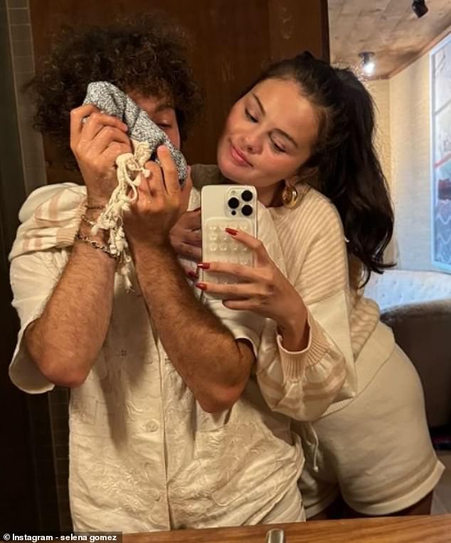 Selena Gomez followed a wedding planning agency on TikTok amid her engagement rumors to Benny Blanco. This week, she posted a heartwarming mirror selfie of herself cuddling up to her rumored fiancé Benny Blanco, who shyly covered his face