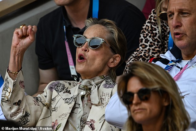 Sharon Stone put on a lively show in a floral wreath as she cheered on the men's tennis final between Spain and Serbia on Sunday at the 2024 Paris Olympics