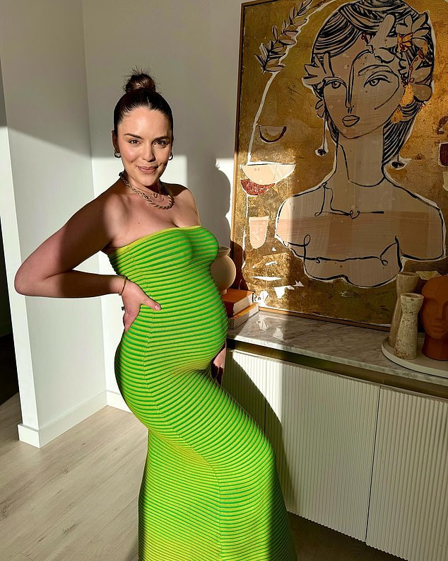 Olympia Valance (pictured) showed off her growing baby bump in a series of Instagram posts on Wednesday