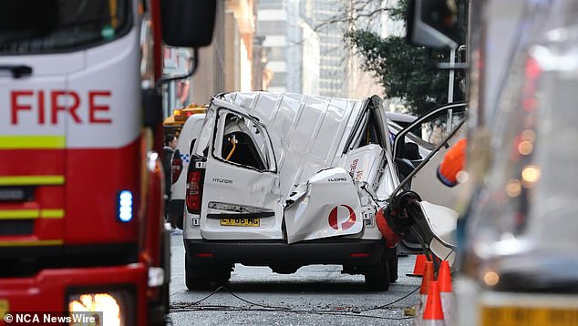 The incident reportedly saw part of a crane platform fall onto an Australia Post van.