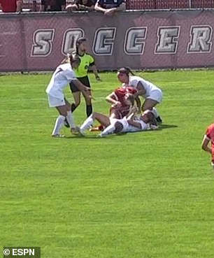 Lamond pulled Girman's hair as they scrambled across the floor