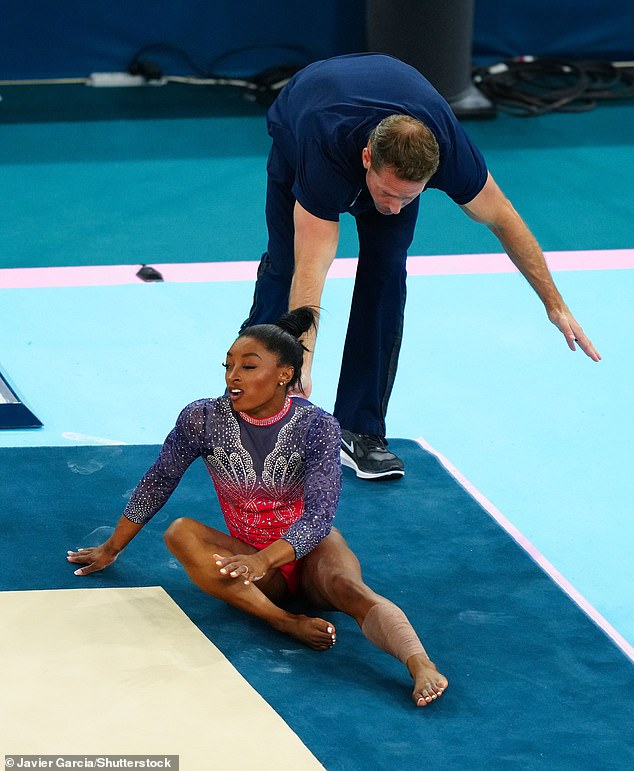 Biles fell during her floor exercise warm-up, aggravating a calf problem